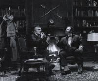 Holmes and Watson toasting