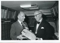 Benny Goodman receiving the IIT Hall of Fame medal and plaque from IIT Provost Sidney Guralnick, Chicago, Illinois, ca. 1980