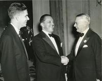 Henry Heald, Ludwig Mies van der Rohe, and James Cunningham at Mies' appointment dinner, Chicago, Illinois, 1938