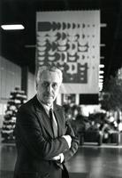 Benjamin de Brie Taylor with banner in Hermann Hall, Illinois Institute of Technology, Chicago, IL, ca. 1987