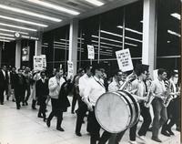 IIT students and faculty meeting the victorious College Bowl team at O'Hare Airport, Chicago, Illinois, 1964