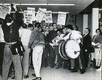 IIT students and faculty meeting the victorious College Bowl team at O'Hare Airport, Chicago, Illinois, 1964