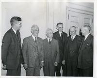 Henry Heald, Clarence Clarke, Fred Rogers, Dr. Linton Grinter, James Cunningham, and Alex Bailey after signing the merger agreement between Armour Institute and Lewis Institute, Chicago, Illinois, October, 1939