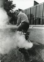 Brunn Roysden on a steam-powered bicycle, Illinois Institute of Technology, Chicago, Illinois, 1974