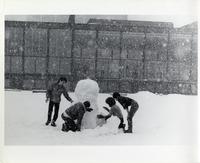 Students building a snowman, Illinois Institute of Technology, Chicago, Illinois, 1980s