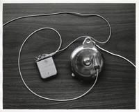 Implantable drug pump for treating cardiac arrhythmia, ca. 1975-1985