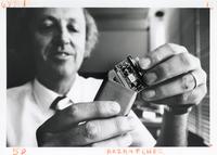 Robert Arzbaecher with smart pacemaker, Illinois Institute of Technology, Chicago, Illinois, ca. 1979-1987