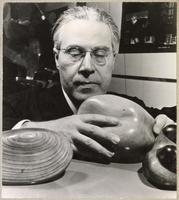 László Moholy-Nagy with hand sculptures, ca. 1945