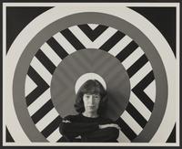 Photograph of Mary Henry in front of her painting Vivo, ca. 1969