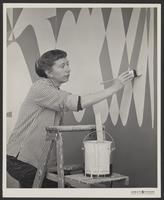 Mary Henry painting an interior mural at Hewlett-Packard, Palo Alto, California, ca. 1958